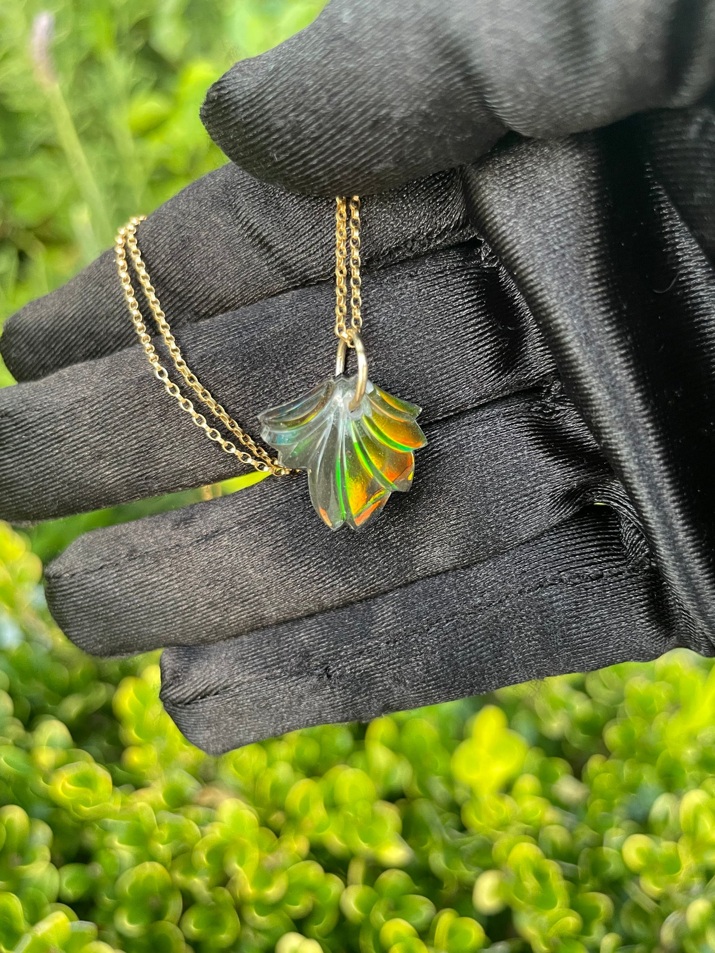 Carved Ammolite Pendant