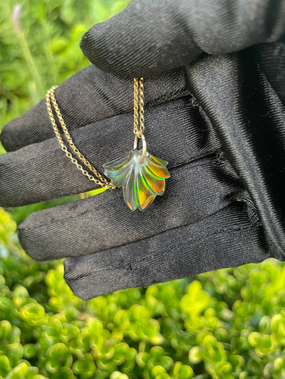 Carved Ammolite Pendant